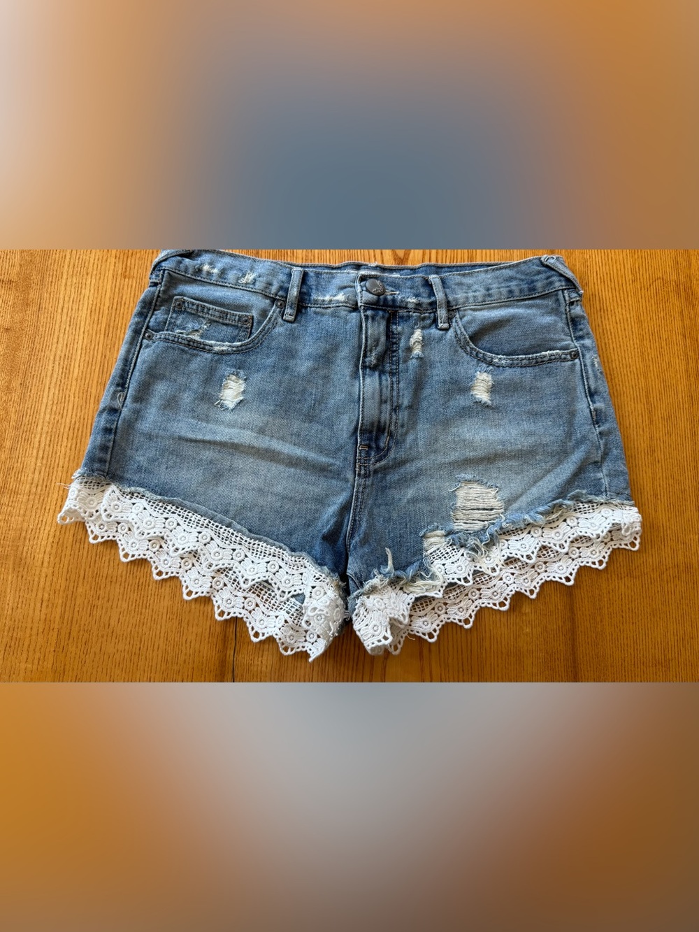 Free People Blue Distressed Denim Shorts with White Lace Hem